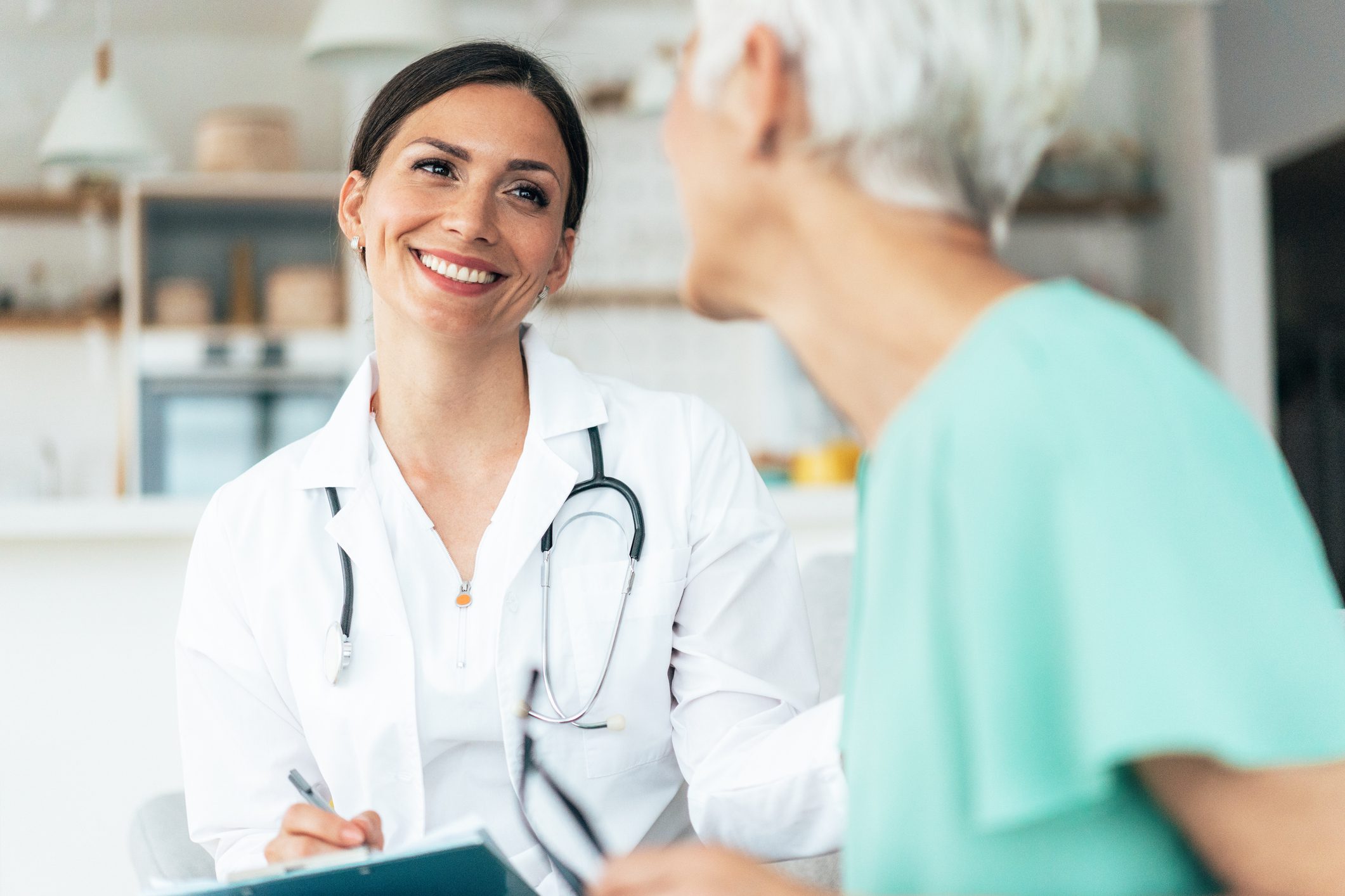 Doctor consulting with a modern senior woman Doctor consulting with a modern senior woman